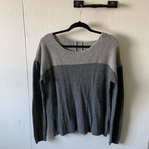 Grey long sleeved knit sweater